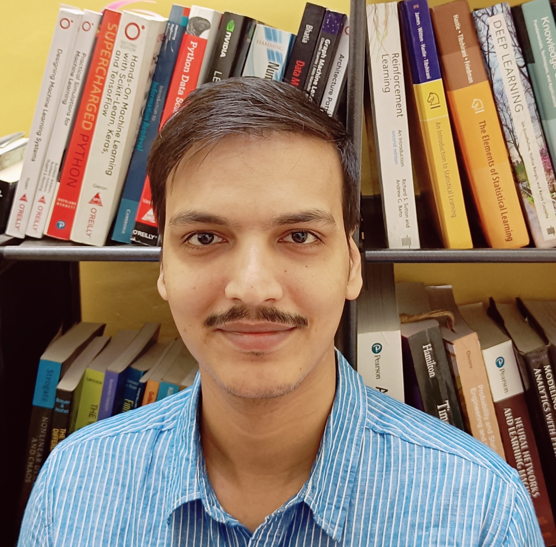 Himanshu, photographed outdoors, facing the camera.
